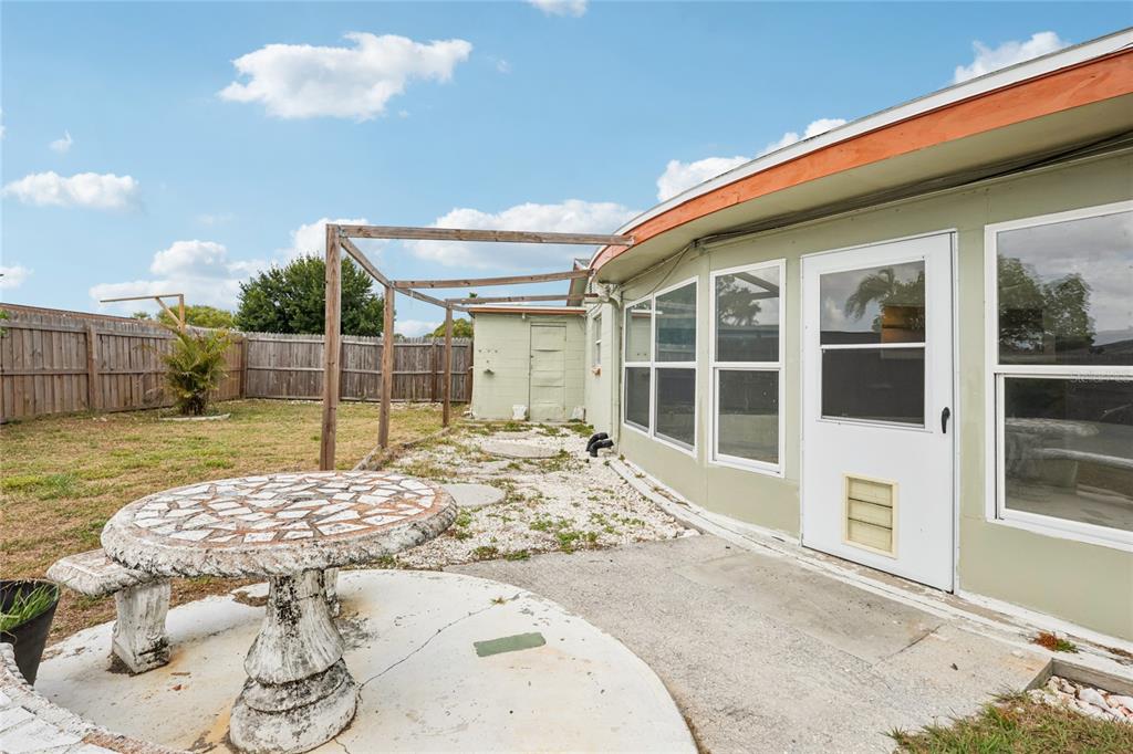3548 Darlington Road Holiday, FL 34691 - Photo 29 of 32 a view of a house with a backyard