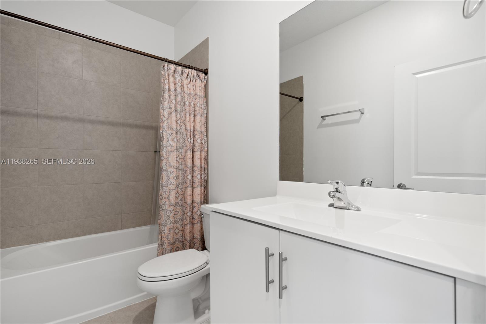 13388 Southwest 286th Street Homestead, FL 33033 - Photo 14 of 46 a bathroom with a sink a toilet and shower