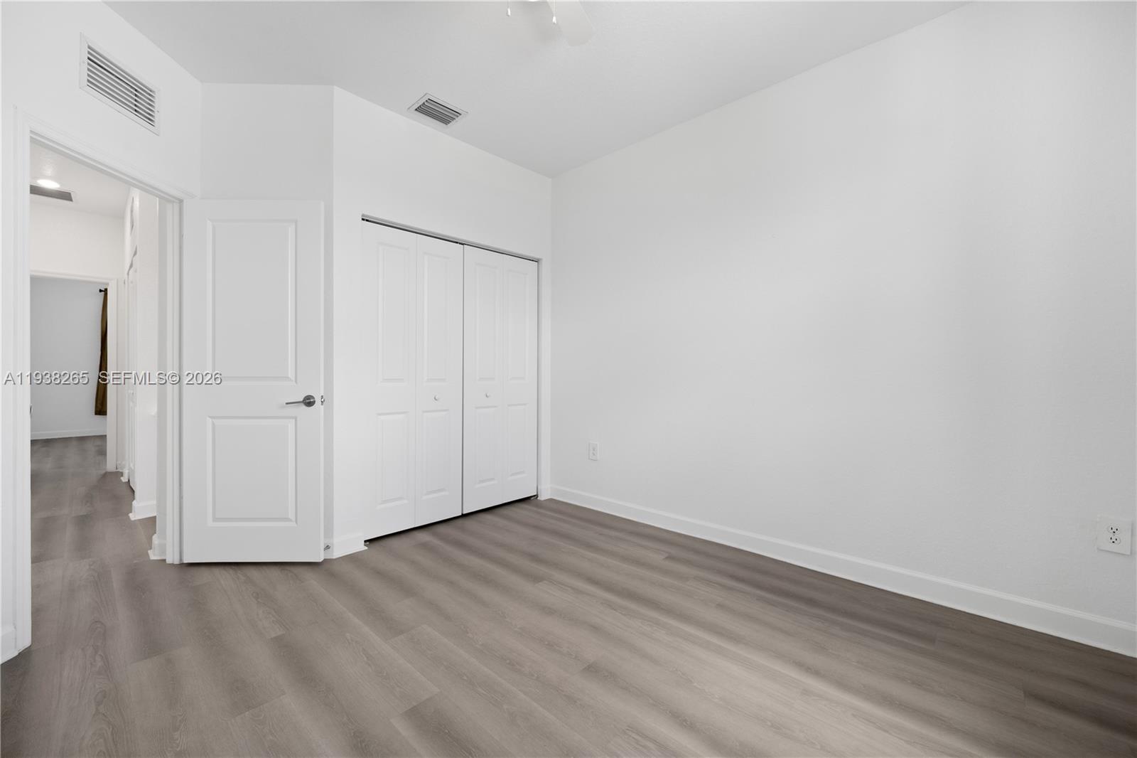 13388 Southwest 286th Street Homestead, FL 33033 - Photo 17 of 46 a view of an empty room
