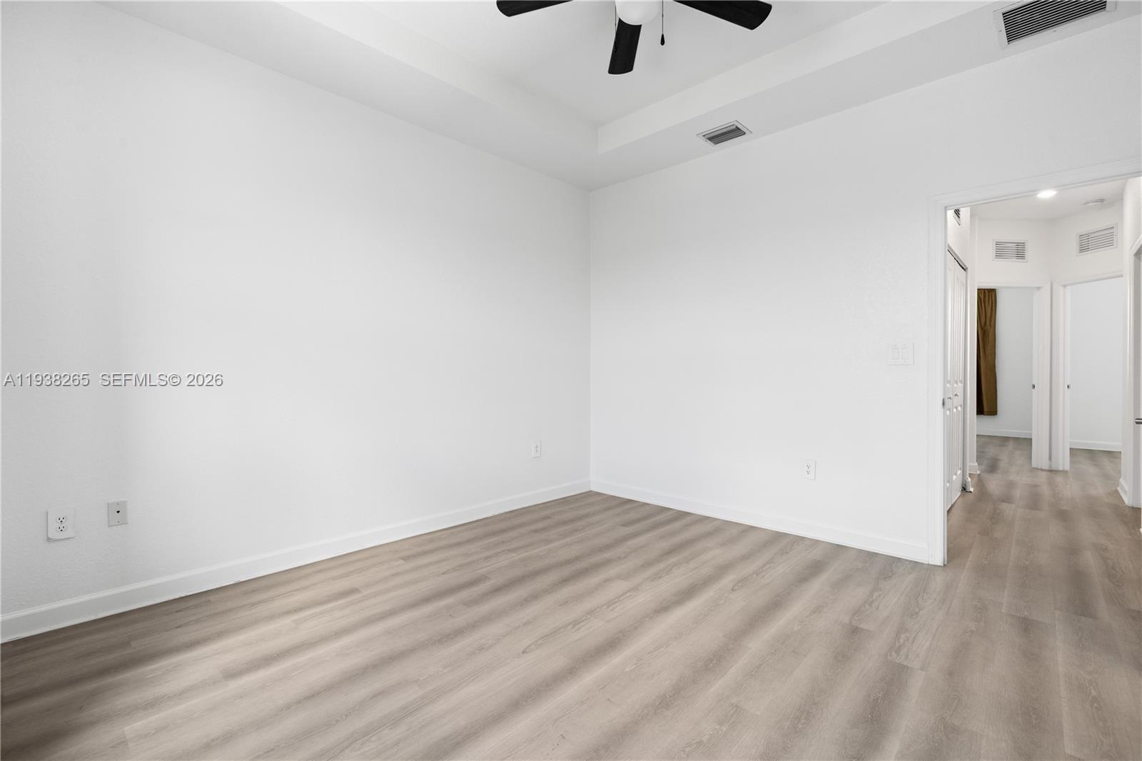 13388 Southwest 286th Street Homestead, FL 33033 - Photo 24 of 46 wooden floor in an empty room