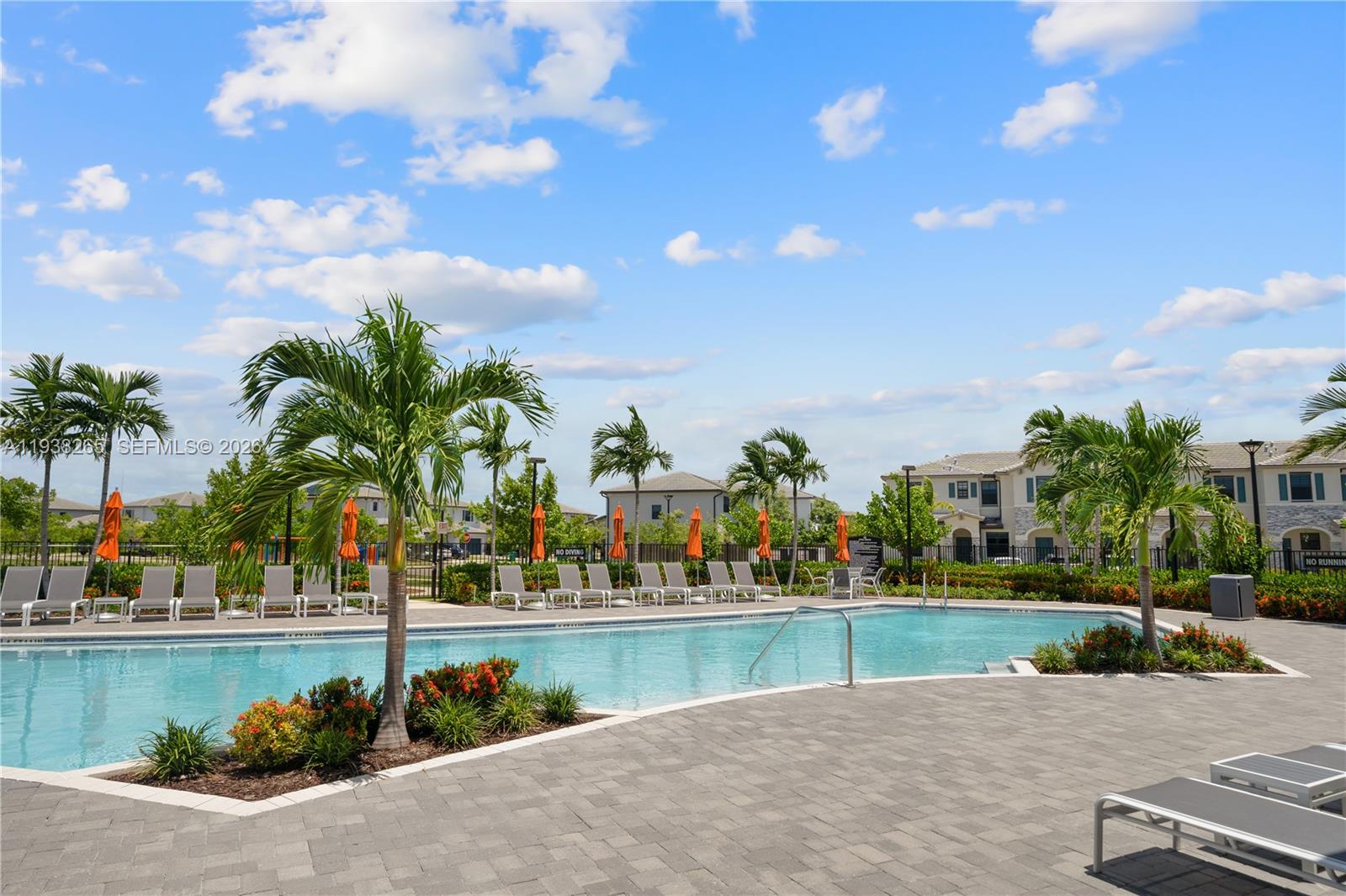 13388 Southwest 286th Street Homestead, FL 33033 - Photo 38 of 46 a view of swimming pool with outdoor seating and plants