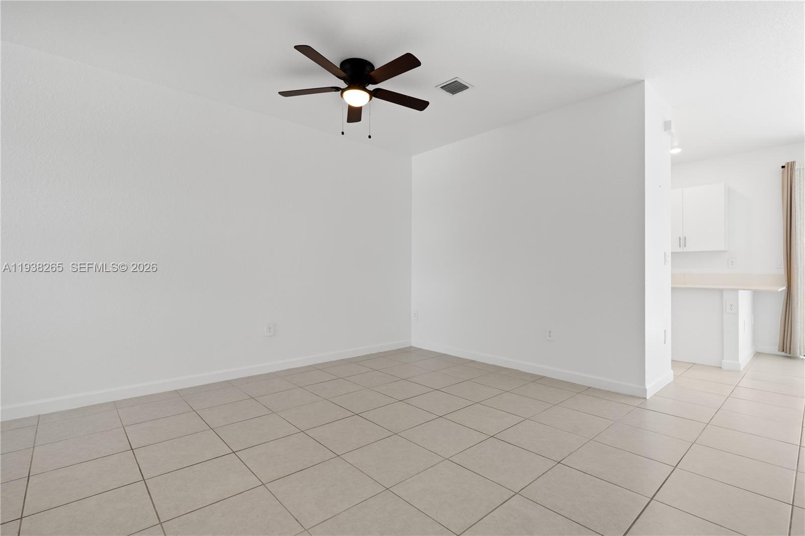 13388 Southwest 286th Street Homestead, FL 33033 - Photo 4 of 46 an empty room