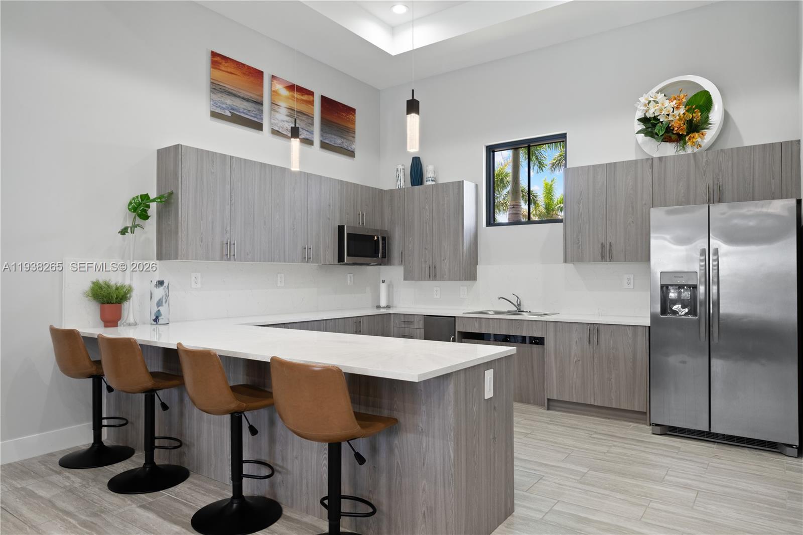 13388 Southwest 286th Street Homestead, FL 33033 - Photo 43 of 46 a kitchen with granite countertop a sink cabinets and stainless steel appliances