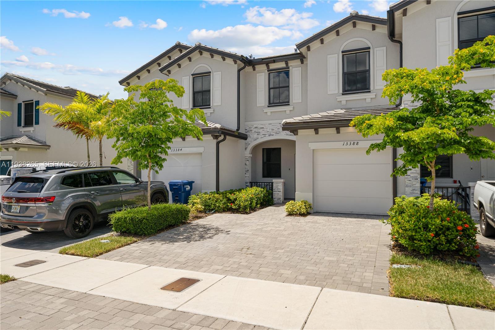 13388 Southwest 286th Street Homestead, FL 33033 - Photo 45 of 46 a view of a house with a yard and potted plants