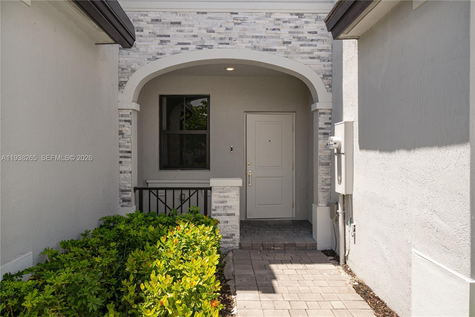 13388 Southwest 286th Street Homestead, FL 33033 - Photo 46 of 46 a front view of a house with a garden