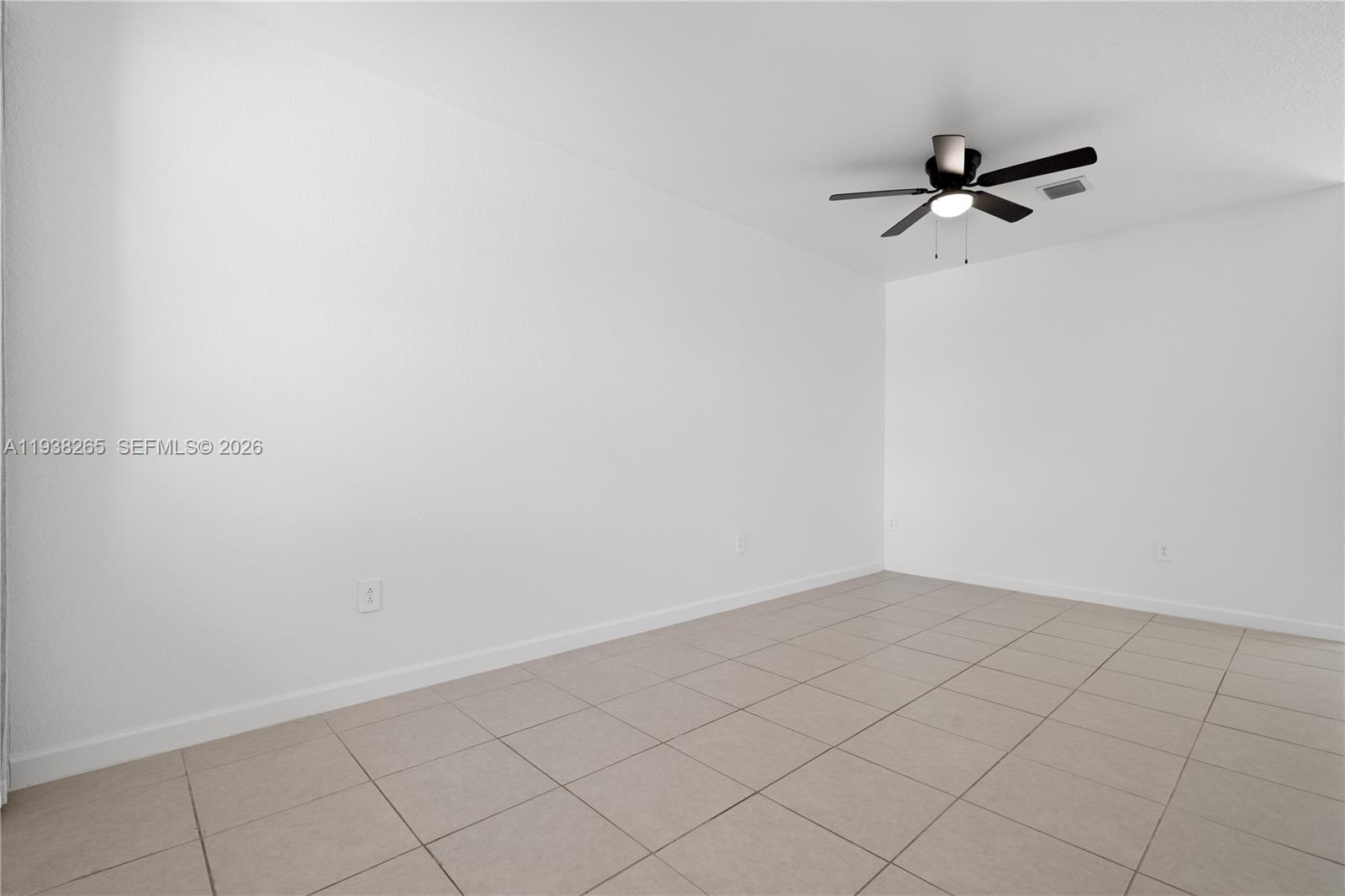 13388 Southwest 286th Street Homestead, FL 33033 - Photo 6 of 46 a view of an empty room