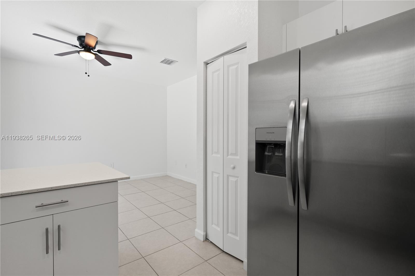 13388 Southwest 286th Street Homestead, FL 33033 - Photo 9 of 46 a bathroom with a glass shower door