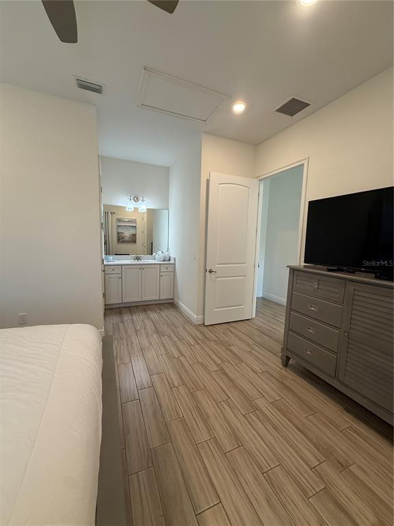 2986 Salted Rim Road Kissimmee, FL 34747 - Photo 26 of 32 a living room with furniture and flat screen tv