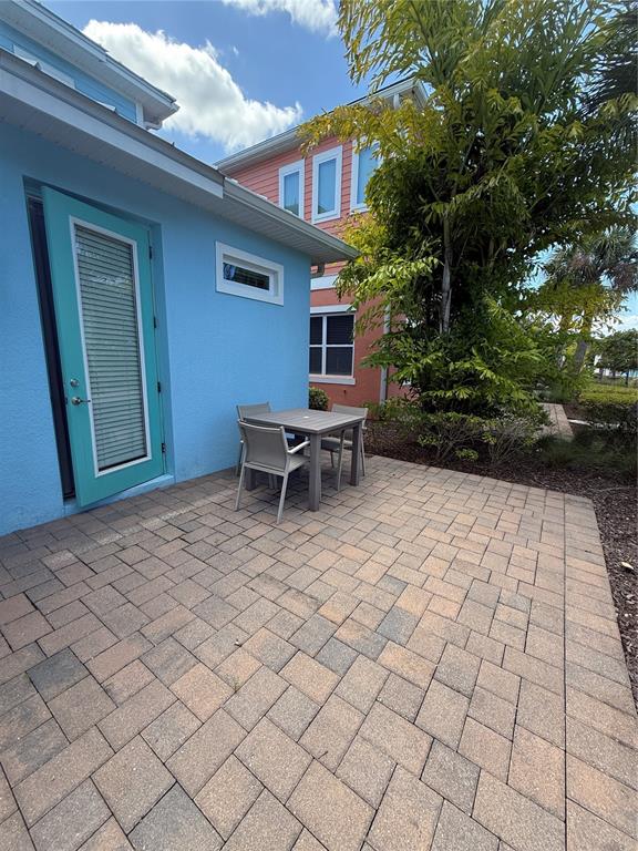 2986 Salted Rim Road Kissimmee, FL 34747 - Photo 28 of 32 a view of a lounge chairs in a patio