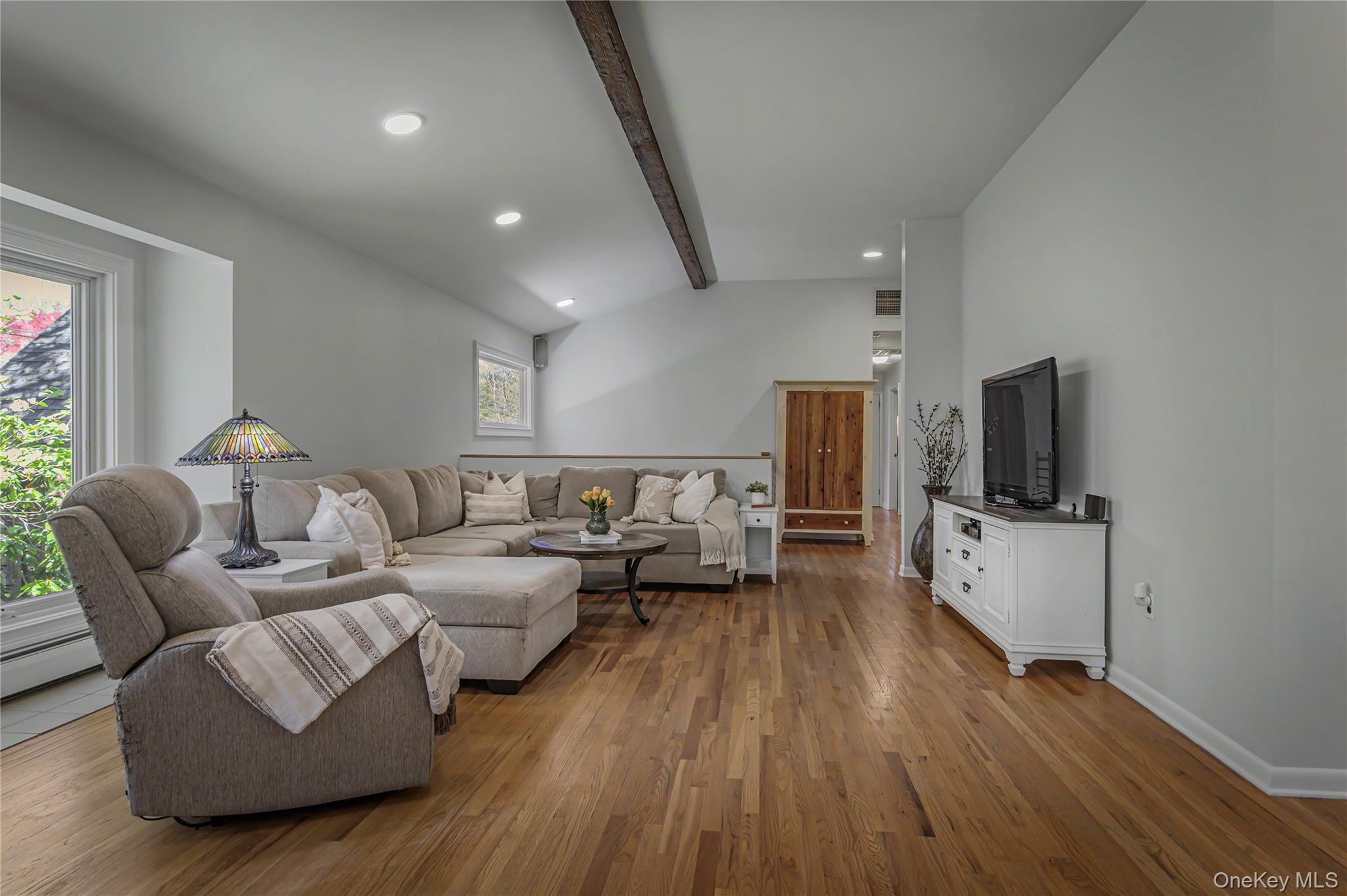 41 Cross Pond Road Pound Ridge, NY 10576 - Photo 6 of 41 a living room with furniture and a flat screen tv
