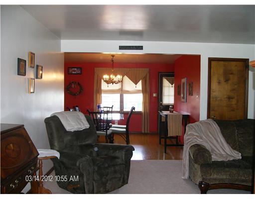 Dining Room. *View of Artistic Dining Room Area* *Door to Roofed Porch*