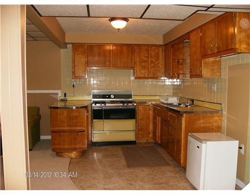 648 Alexander Avenue Monaca, PA 15061 - Photo 10 of 18 Kitchen. *Lower Level Kitchen for those special gatherings around the cozy fireplace*