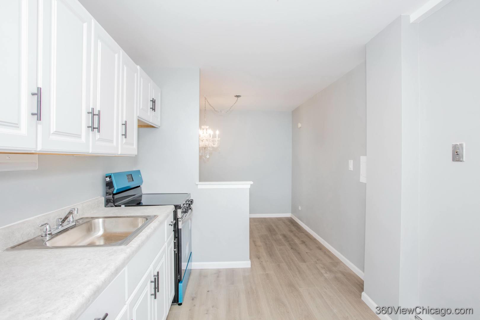 6300 North Sheridan Road, Unit 517 Chicago, IL 60660 - Photo 9 of 13 a view of a kitchen sink and a window