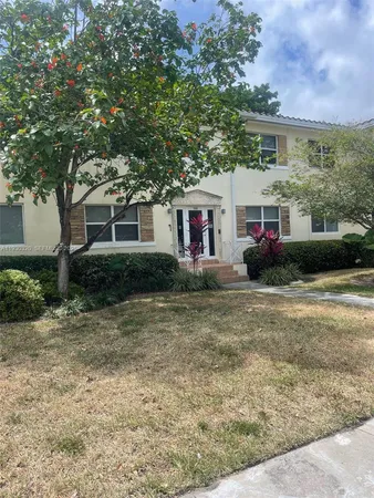 a front view of house with yard