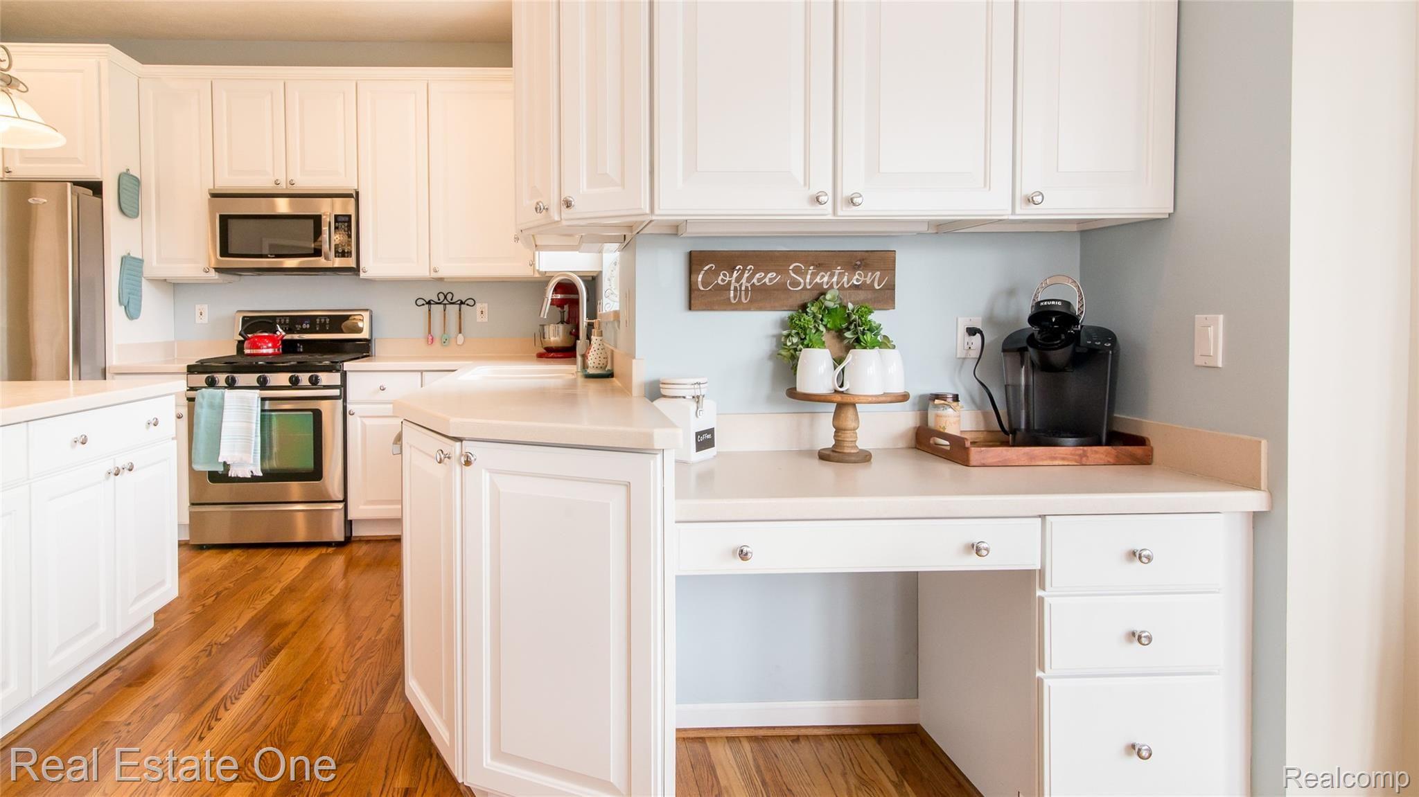 2610 Clivedon Road Howell, MI 48843 - Photo 22 of 43 built in desk doubles as a perfect coffee bar