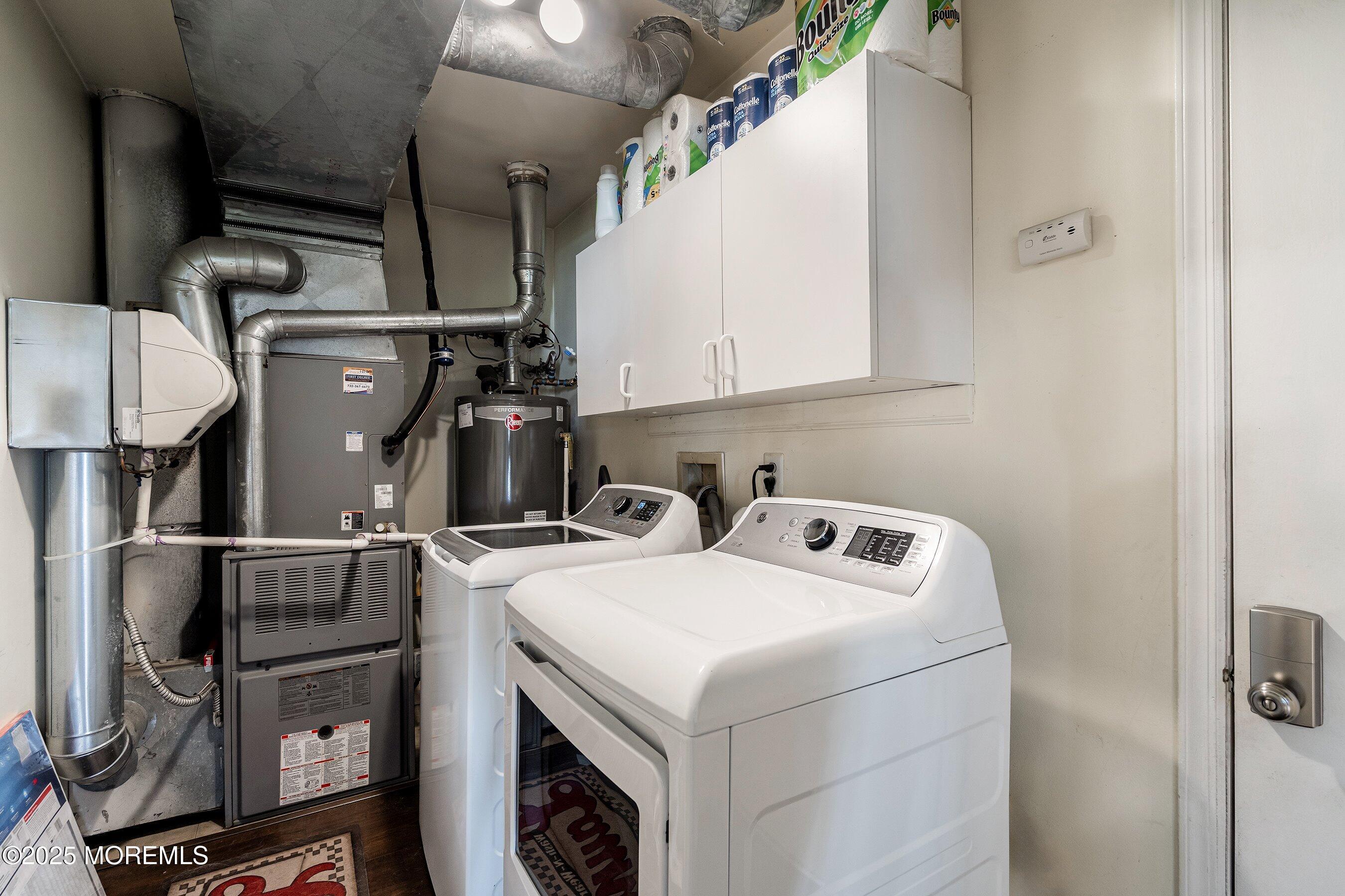 131 Starlight Road Howell, NJ 07731 - Photo 22 of 35 a utility room with dryer and washer