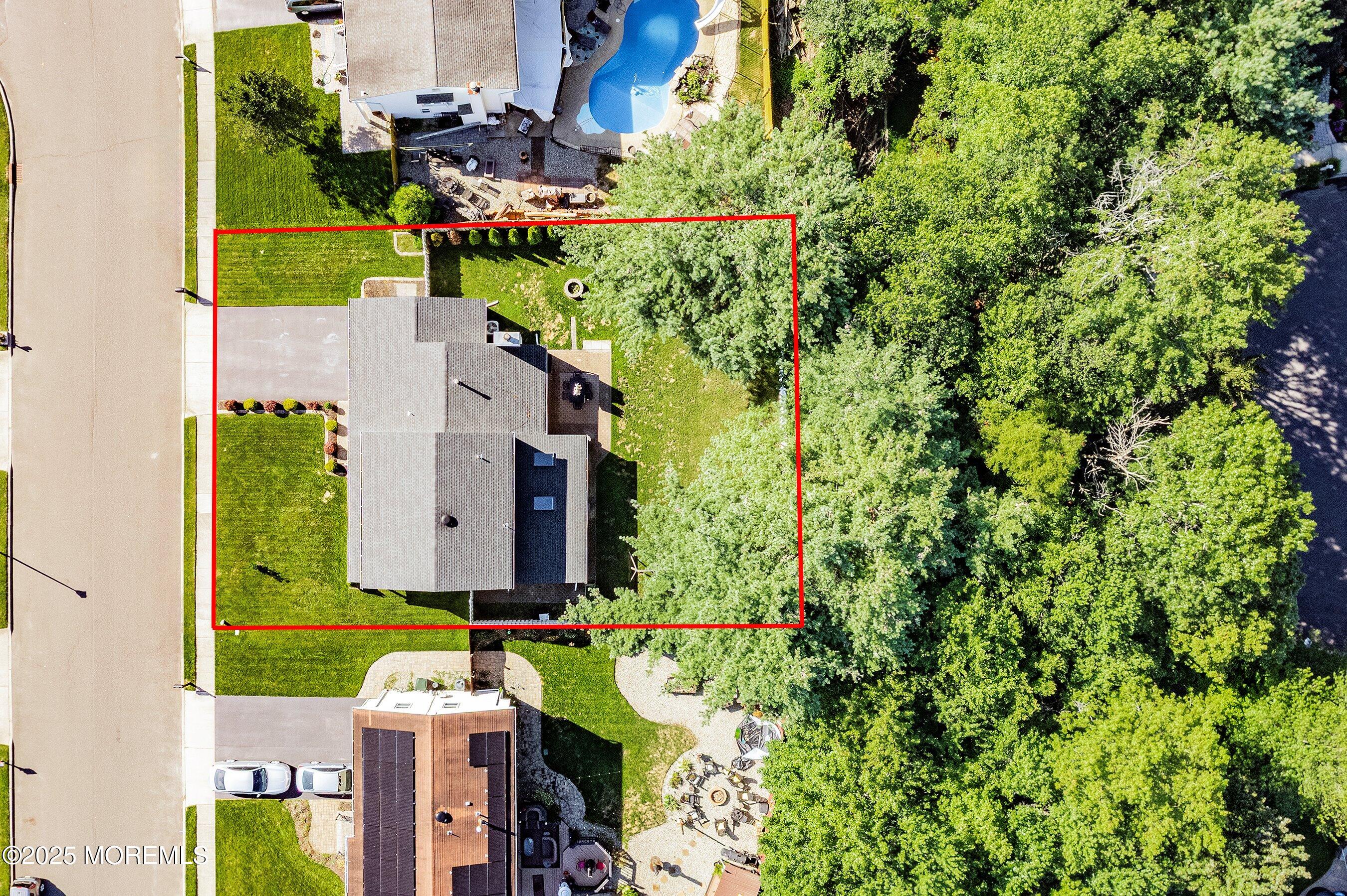 131 Starlight Road Howell, NJ 07731 - Photo 26 of 35 an aerial view of residential house with outdoor space and trees