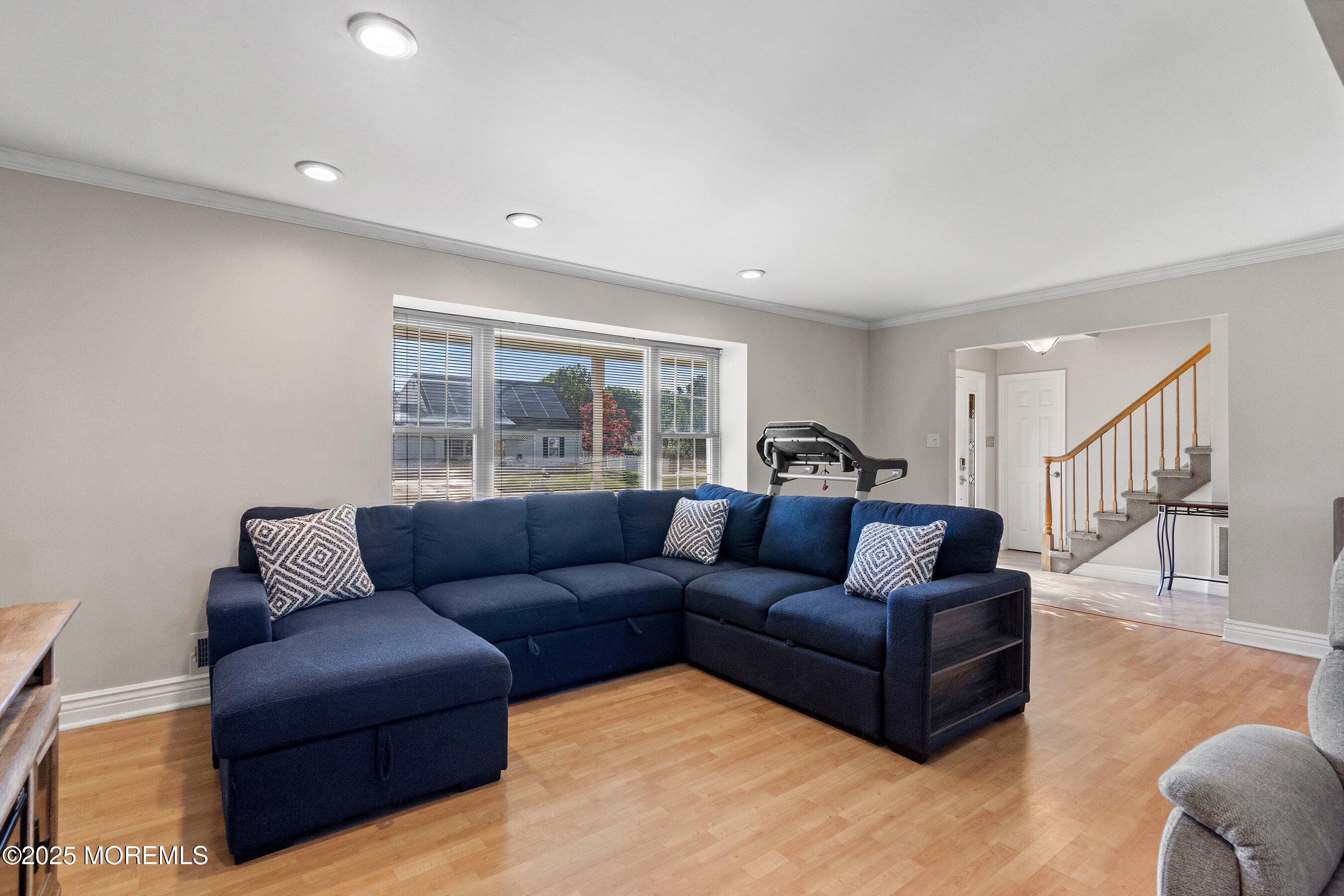 131 Starlight Road Howell, NJ 07731 - Photo 5 of 35 a living room with furniture and a large window