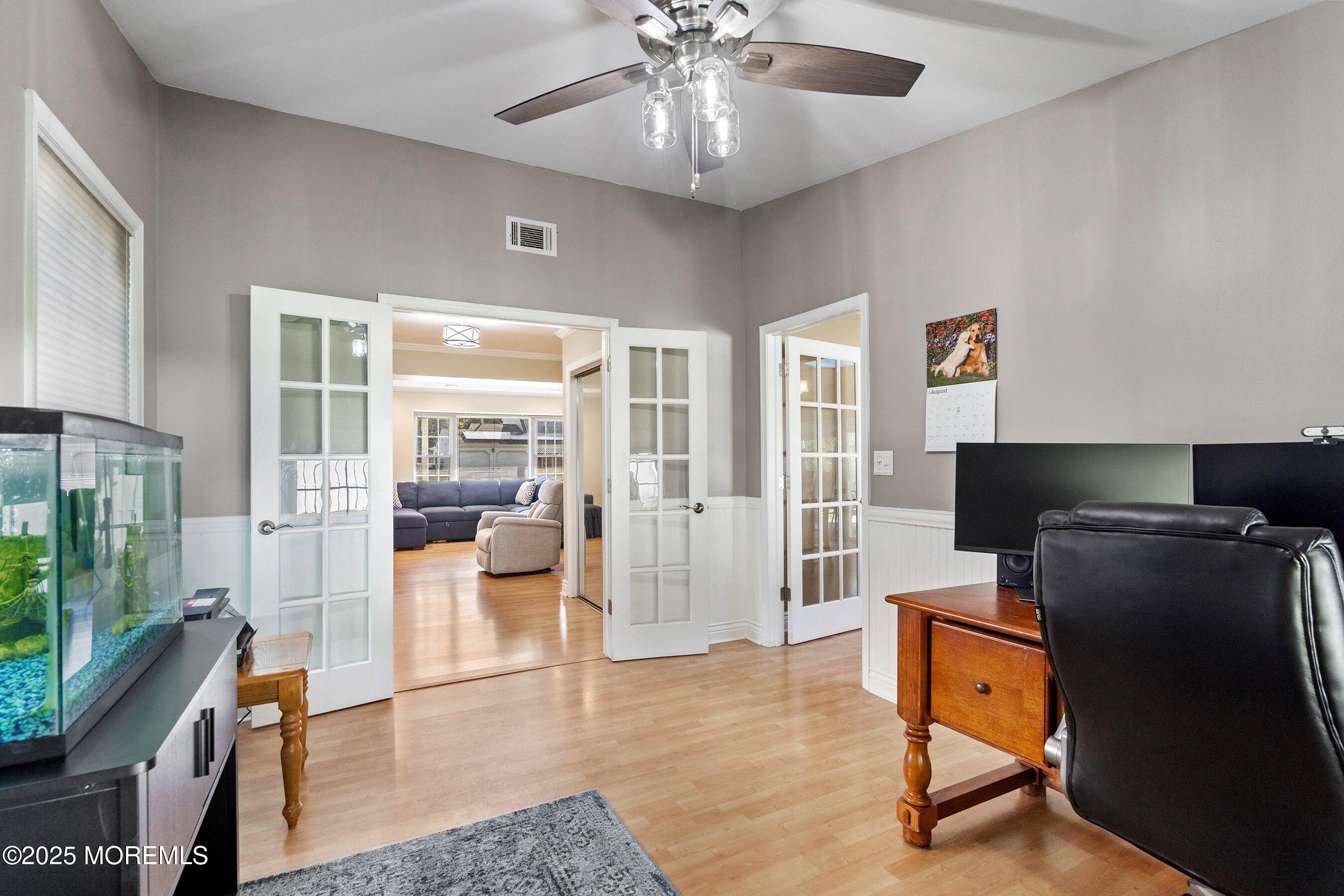 131 Starlight Road Howell, NJ 07731 - Photo 8 of 35 a view of a livingroom with furniture and a flat screen tv