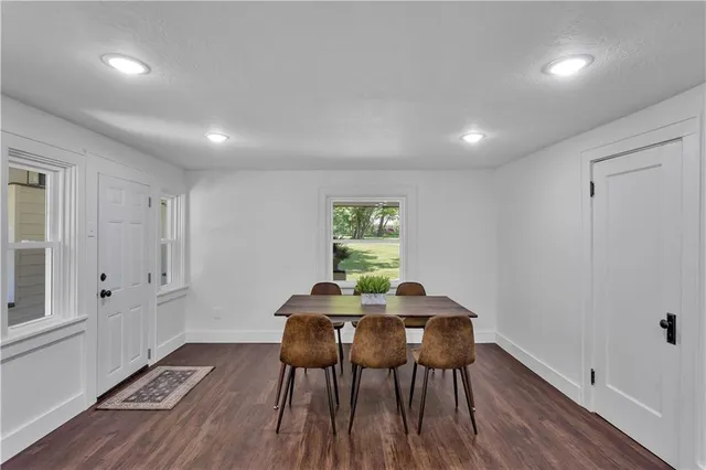a workspace with furniture and wooden floor