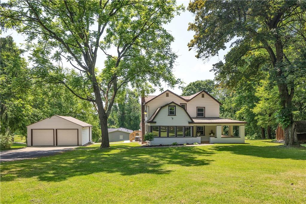 2165 Tuscarawas Road Beaver, PA 15009 - Photo 2 of 39 a front view of a house with yard and green space