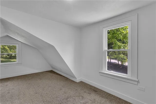 a view of a room that has a window in it