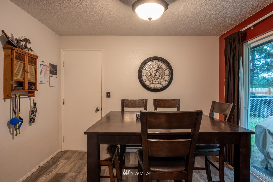 4620 Crescent Court Southwest Rochester, WA 98579 - Photo 8 of 12 a view of a dining room with furniture