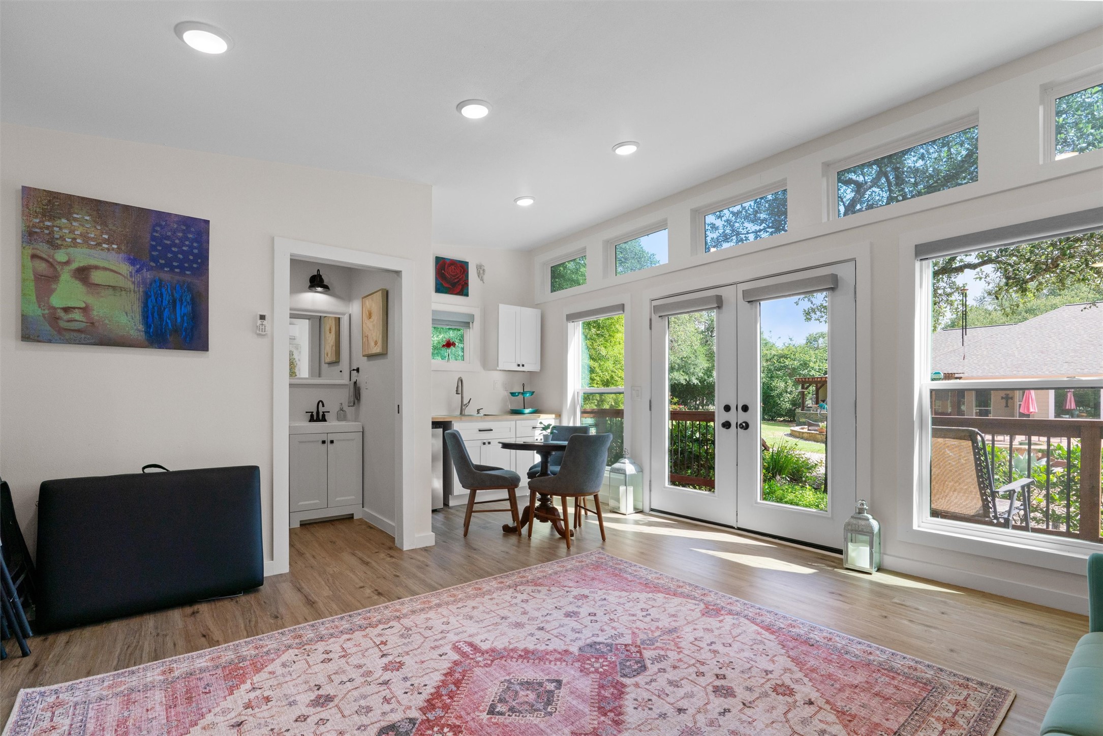 223 East Ridgewood Road Georgetown, TX 78633 - Photo 33 of 40 French doors and an array of windows illuminate this airy interior, seamlessly connecting to outdoor living spaces