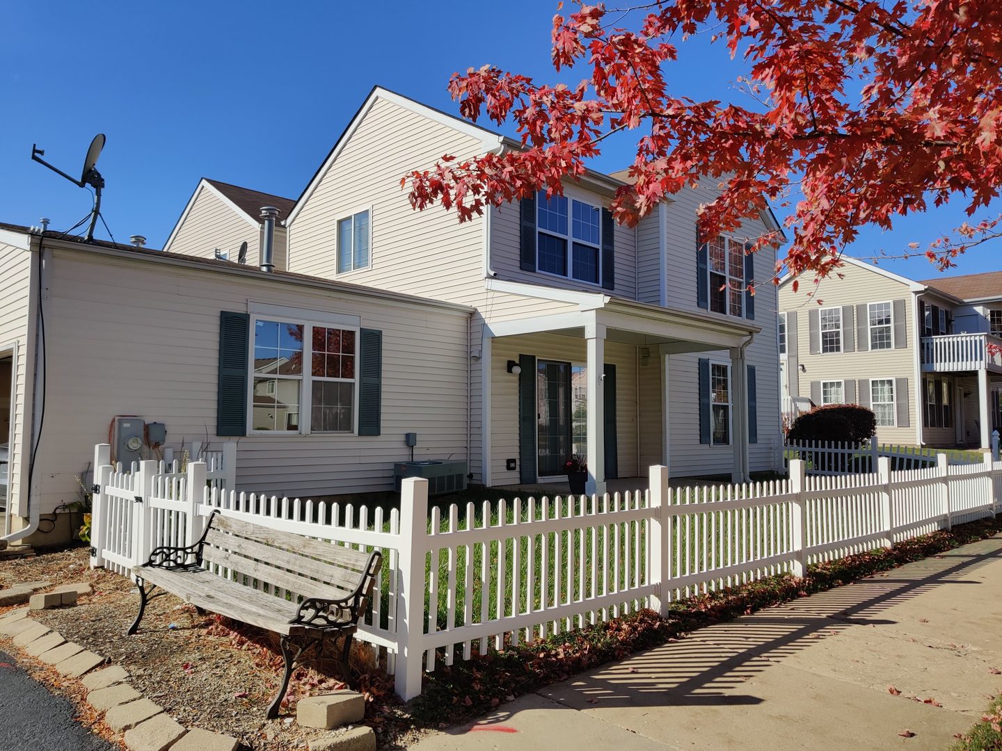889 Symphony Drive Aurora, IL 60504 - Photo 2 of 24 a front view of a house with a porch