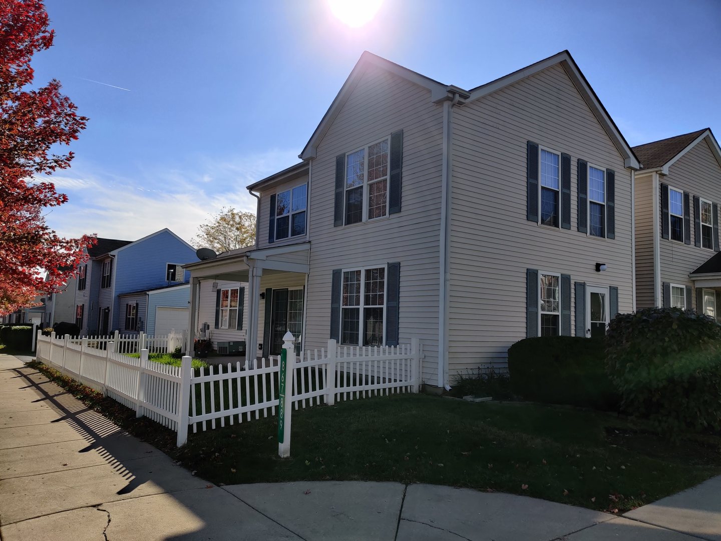 889 Symphony Drive Aurora, IL 60504 - Photo 22 of 24 a front view of house with yard and green space