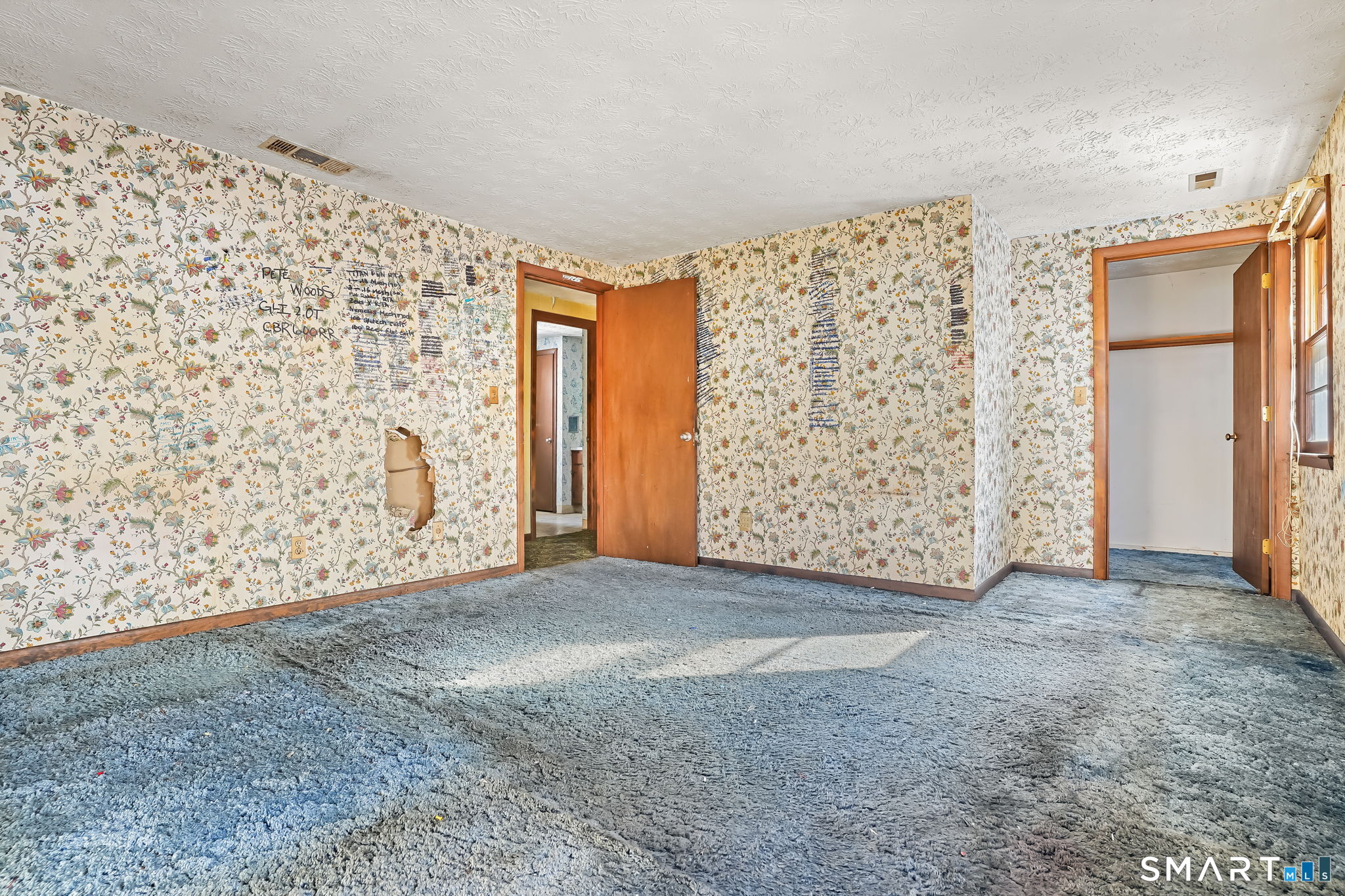 26 George Washington Turnpike Burlington, CT 06013 - Photo 20 of 40 an empty room with a wooden door and shower