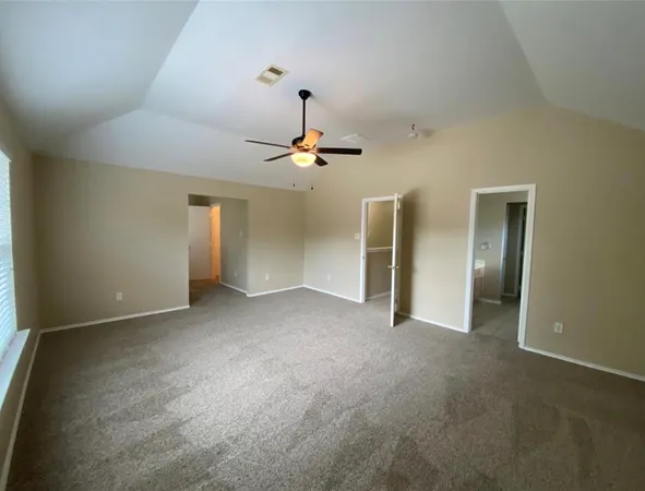 a view of a livingroom with a staircase