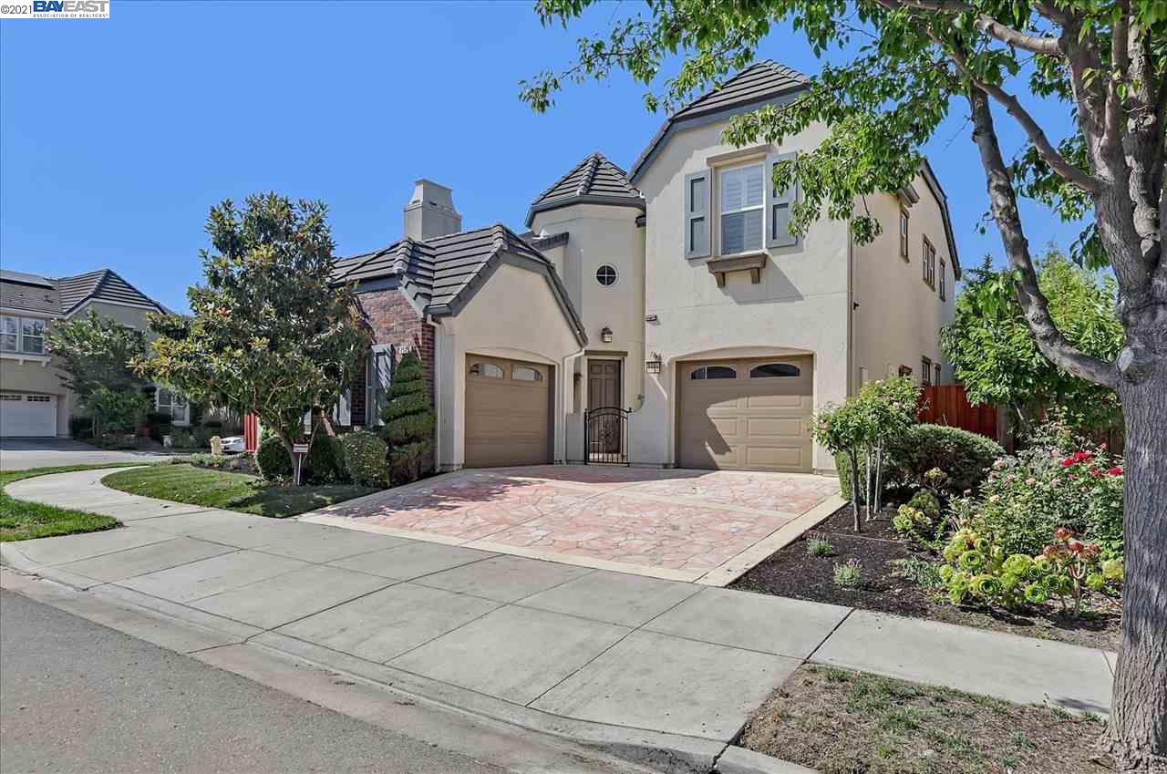 a front view of a house with yard