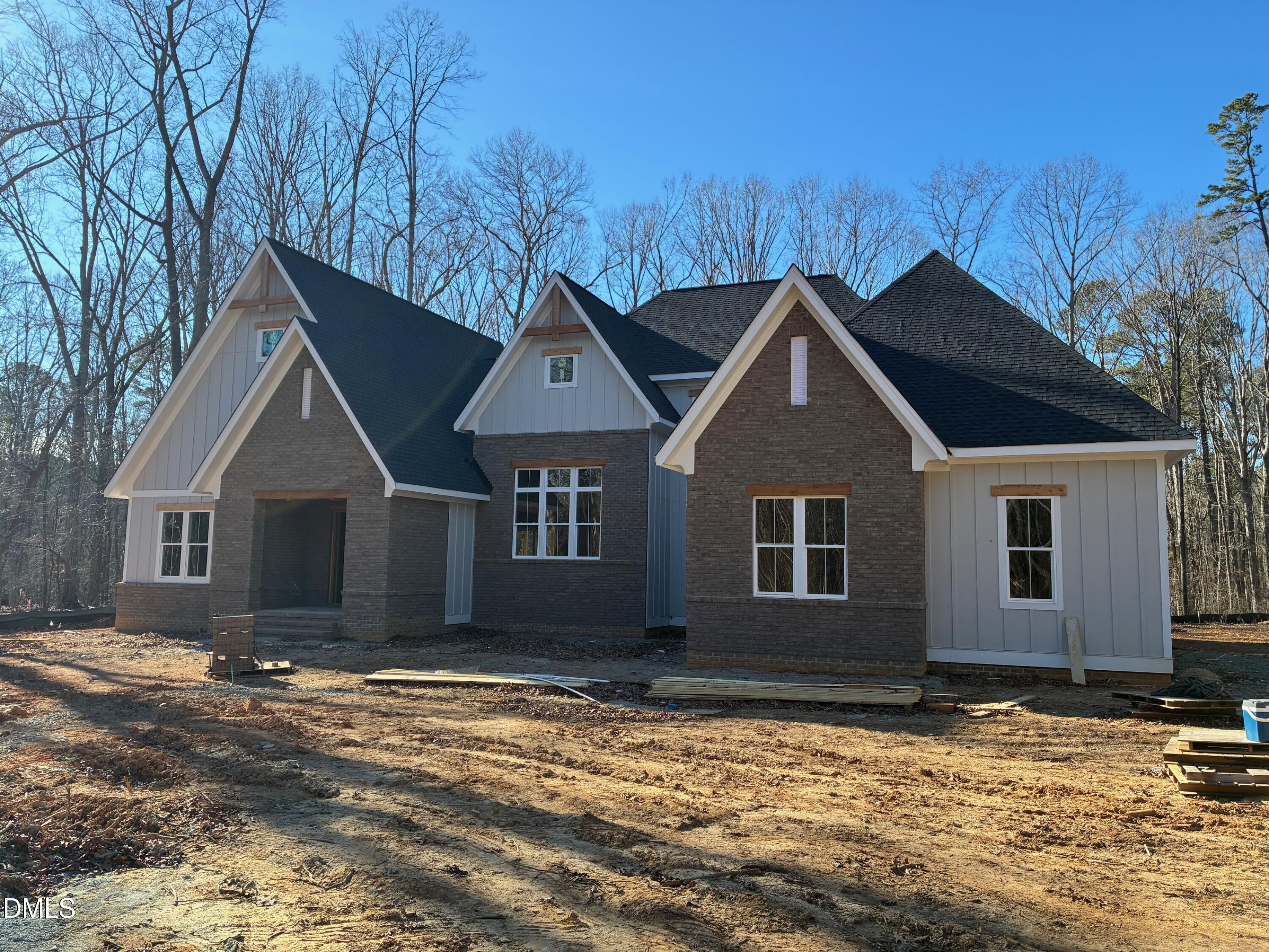 638 Old Goldston Road Pittsboro, NC 27312 - Photo 1 of 12 front view of a house with a yard