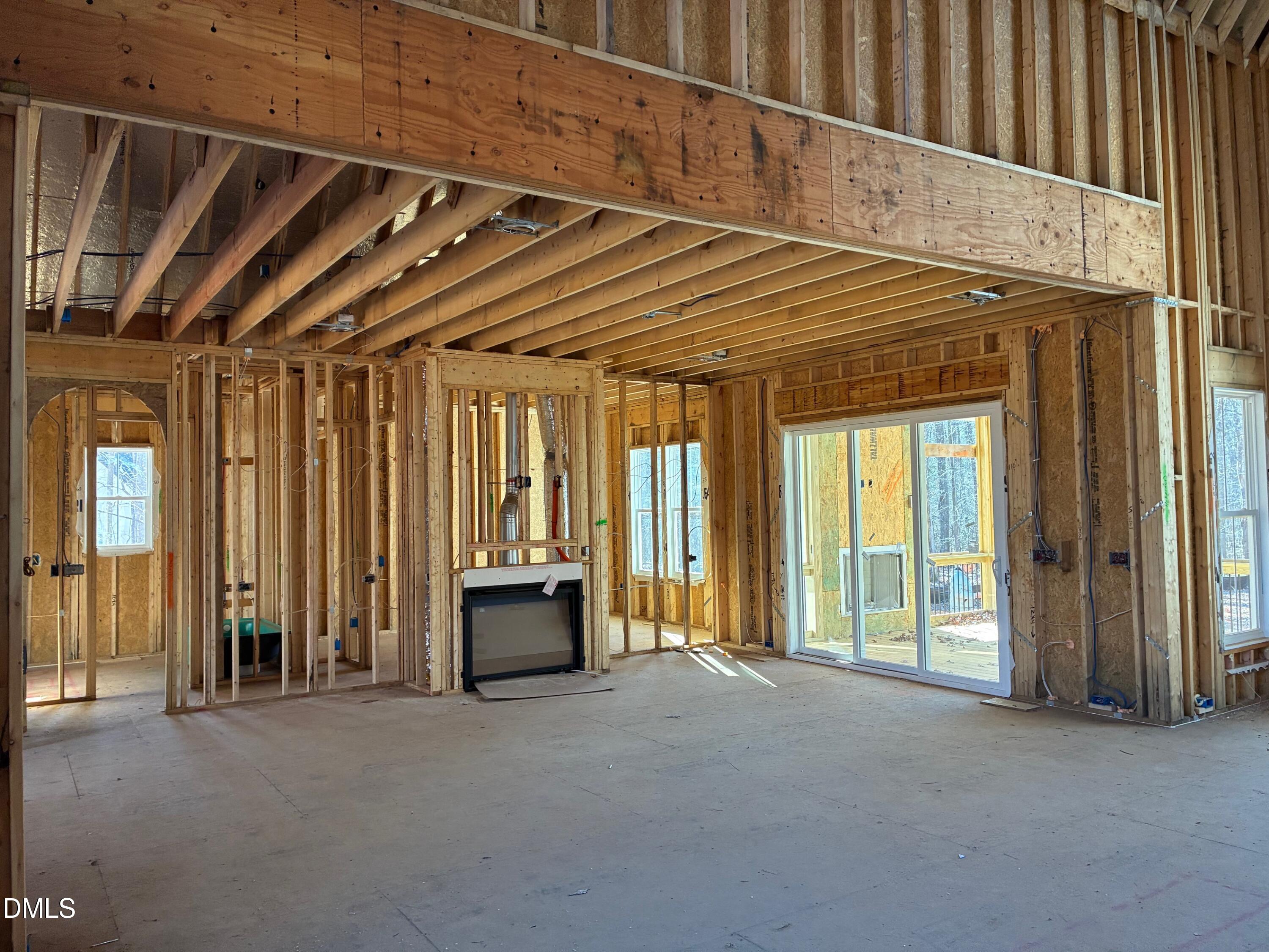 638 Old Goldston Road Pittsboro, NC 27312 - Photo 4 of 12 a view of porch with furniture and large window