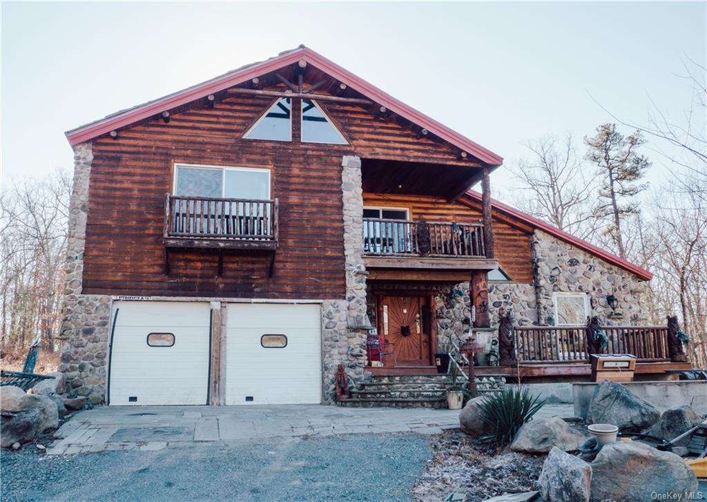 165 Black Forest Road Glen Spey, NY 12737 - Photo 1 of 18 a front view of a house with garden