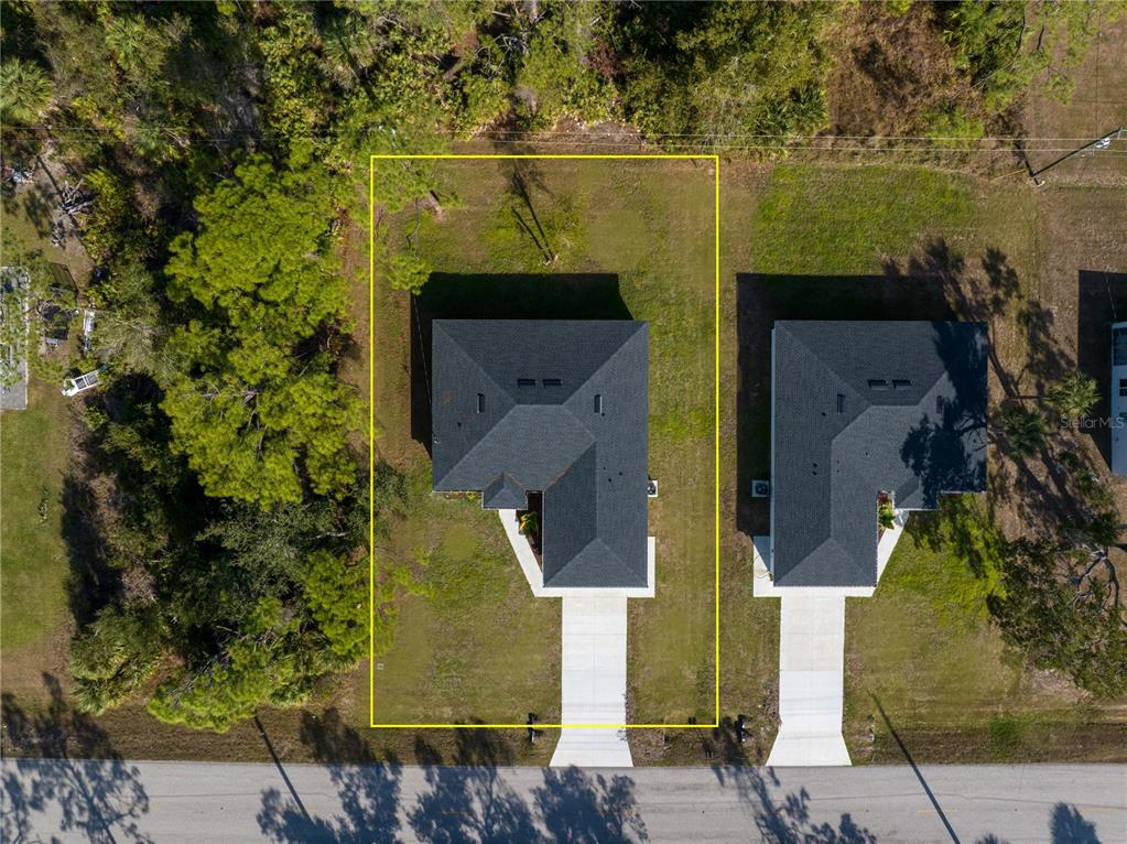 15460 Chamberlain Boulevard Port Charlotte, FL 33953 - Photo 23 of 23 an aerial view of a residential houses with outdoor space