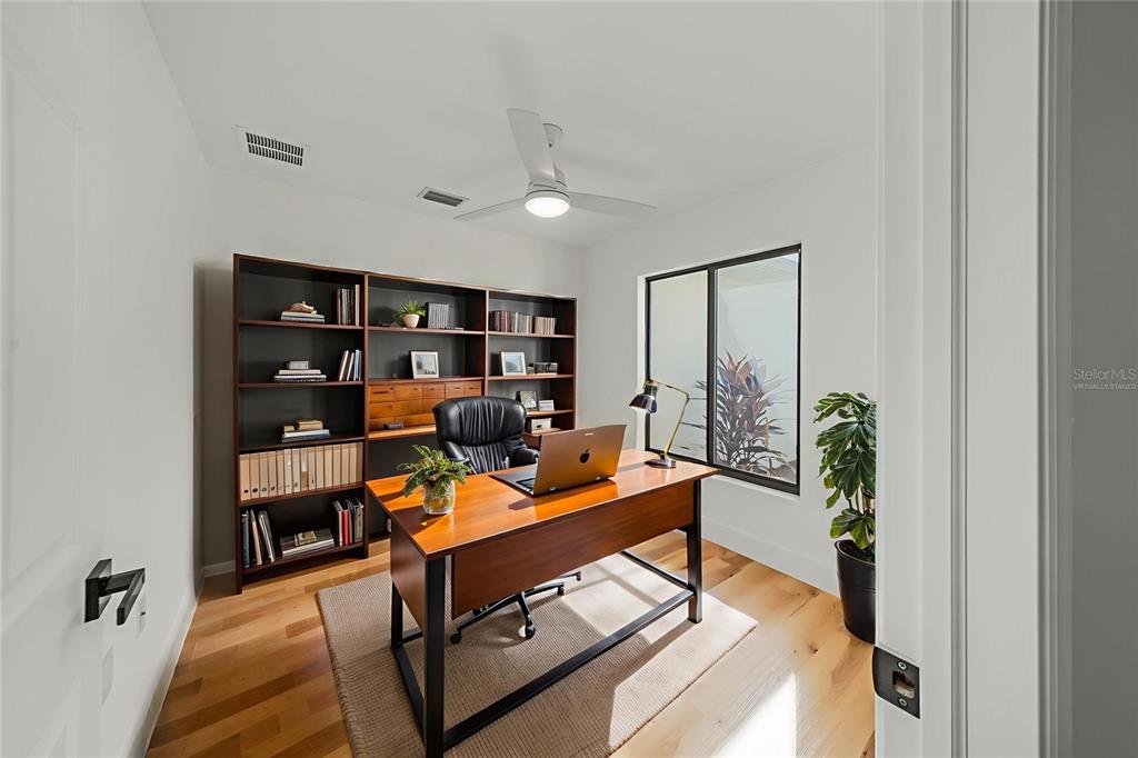 15460 Chamberlain Boulevard Port Charlotte, FL 33953 - Photo 8 of 24 a view of a workspace with furniture