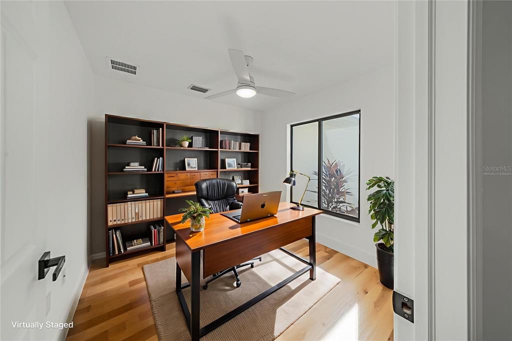 15460 Chamberlain Boulevard Port Charlotte, FL 33953 - Photo 8 of 23 a view of a workspace with furniture