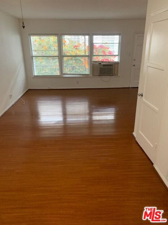 312 South Reeves Drive, Unit E Beverly Hills, CA 90212 - Photo 8 of 10 a view of empty room with window