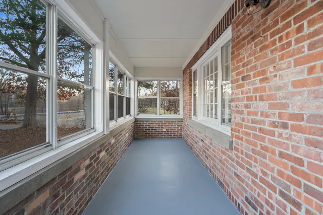 a view of a large room with a large window