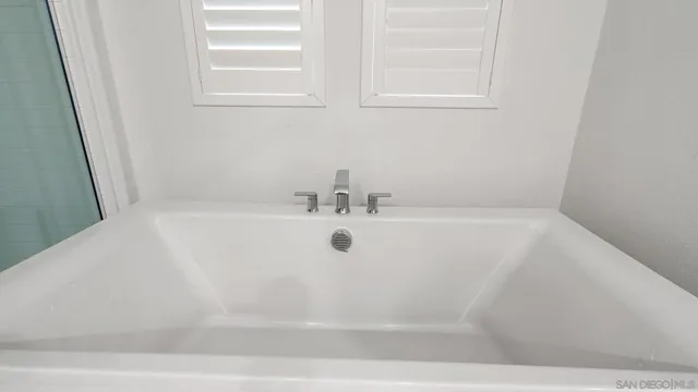 a view of a bathtub in a bathroom