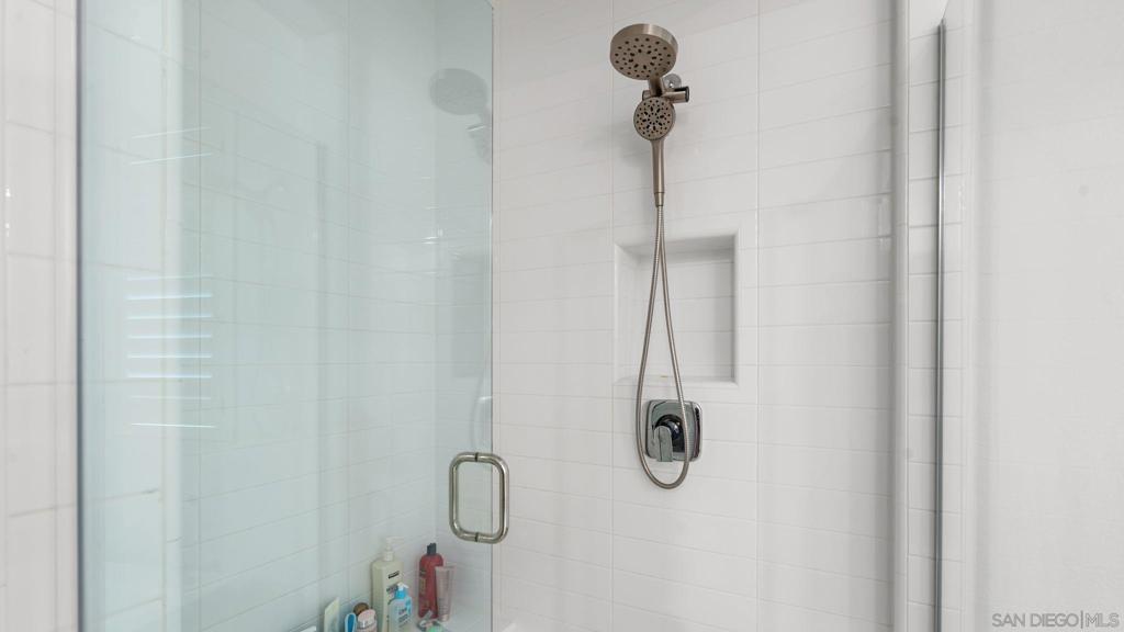 15681 Rennyson Way San Diego, CA 92127 - Photo 16 of 36 a bathroom with a shower