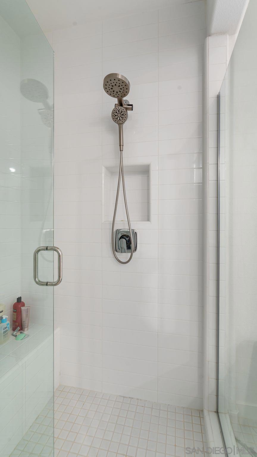 15681 Rennyson Way San Diego, CA 92127 - Photo 17 of 36 a bathroom with a shower