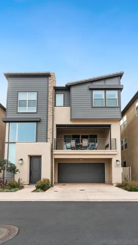 a living room with a fireplace and a fireplace