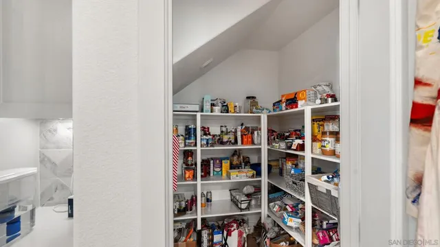 a room with a book shelf and a book shelf