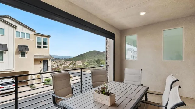 a view of a balcony with chair and the floor