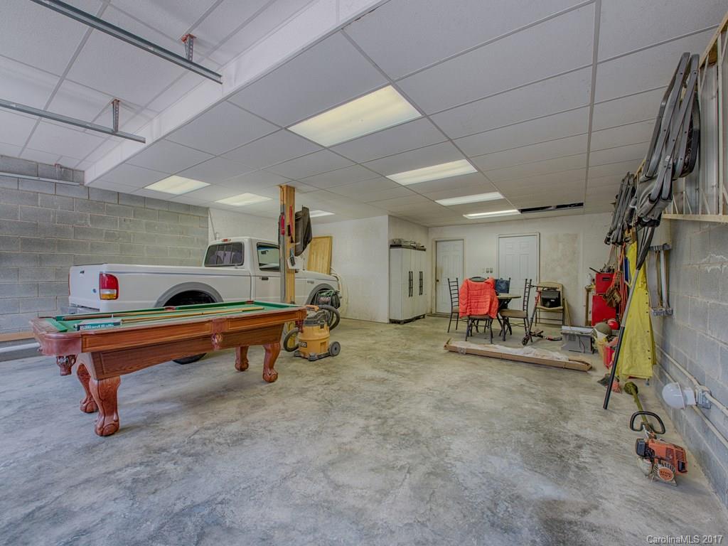 295 Rice Cove Road Canton, NC 28716 - Photo 24 of 24 a view of a room with gym equipment