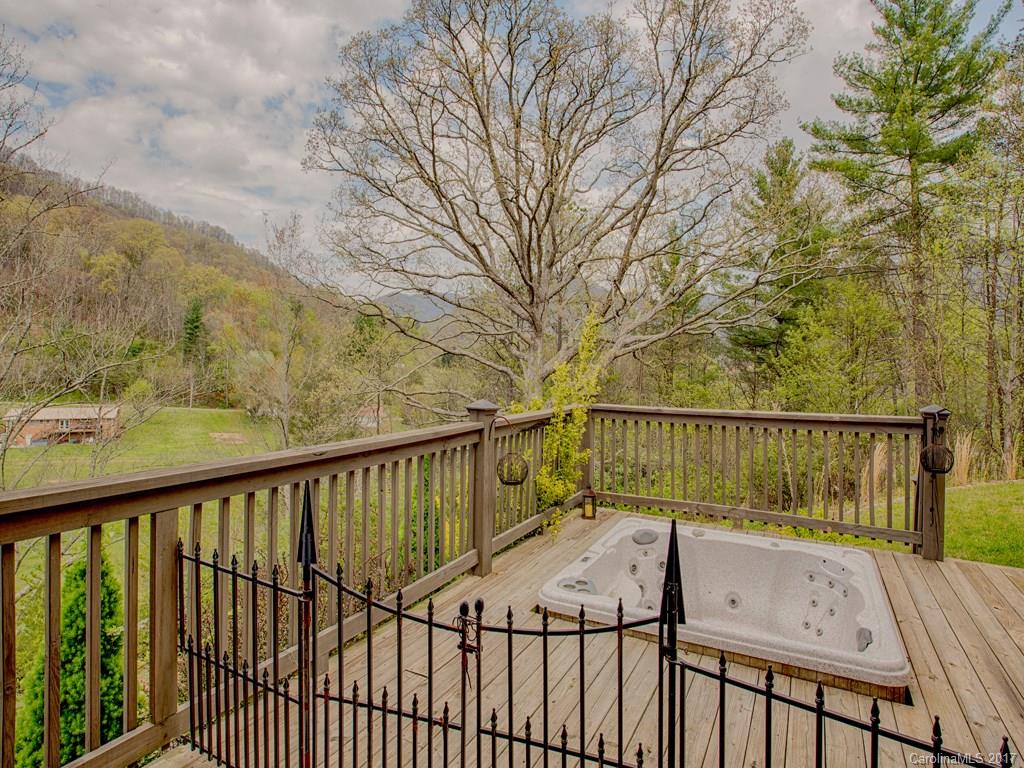 295 Rice Cove Road Canton, NC 28716 - Photo 7 of 24 a view of balcony with wooden floor