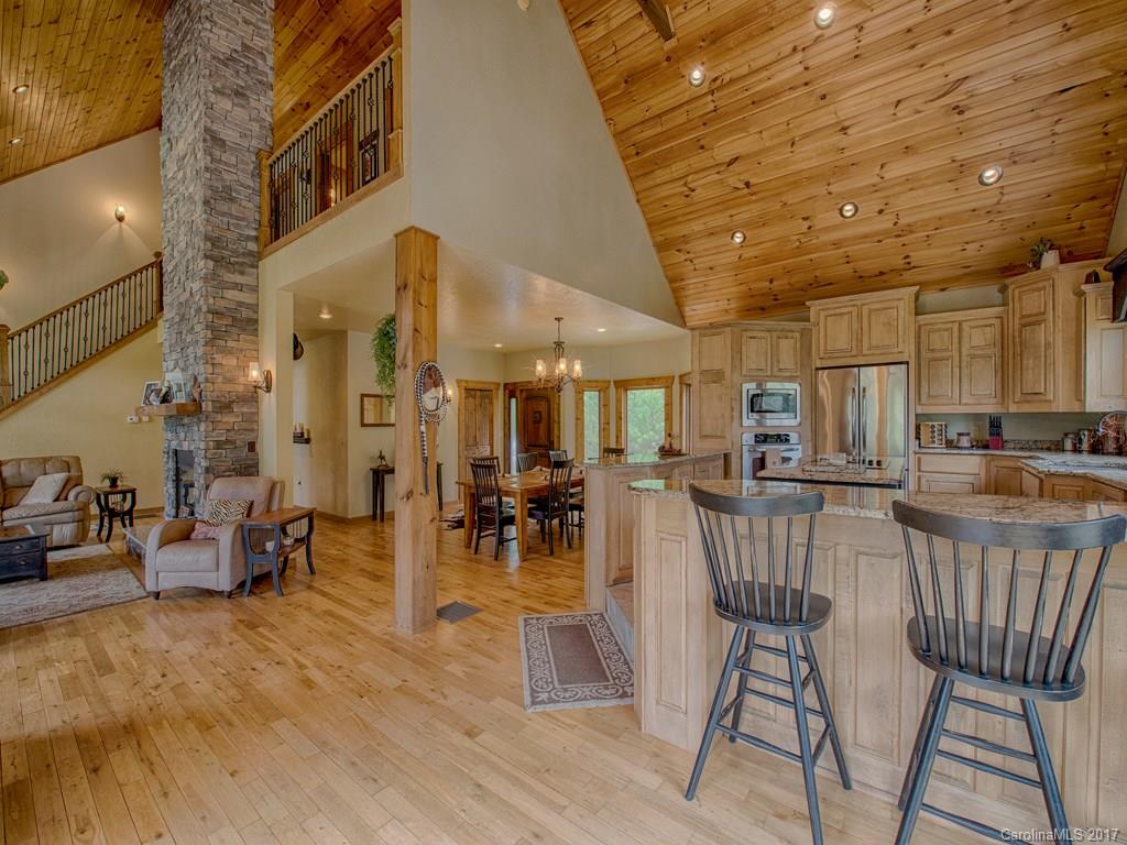 295 Rice Cove Road Canton, NC 28716 - Photo 9 of 24 a view of a dining room with furniture